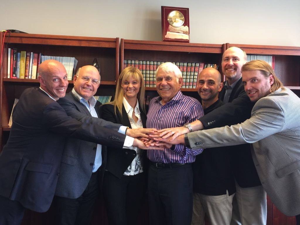 After finalising the transaction terms in New York (from left to right) - Grant Chamberlain, Johnathan Kolbar (YB Capital), Michelle Deaker, John Grillos and Dror Ben-Naim (Smart Sparrow), Brad Lindaas and Seth Stone (ACT)